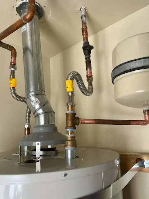 Water heater installation and plumbing repair in West Hampstead